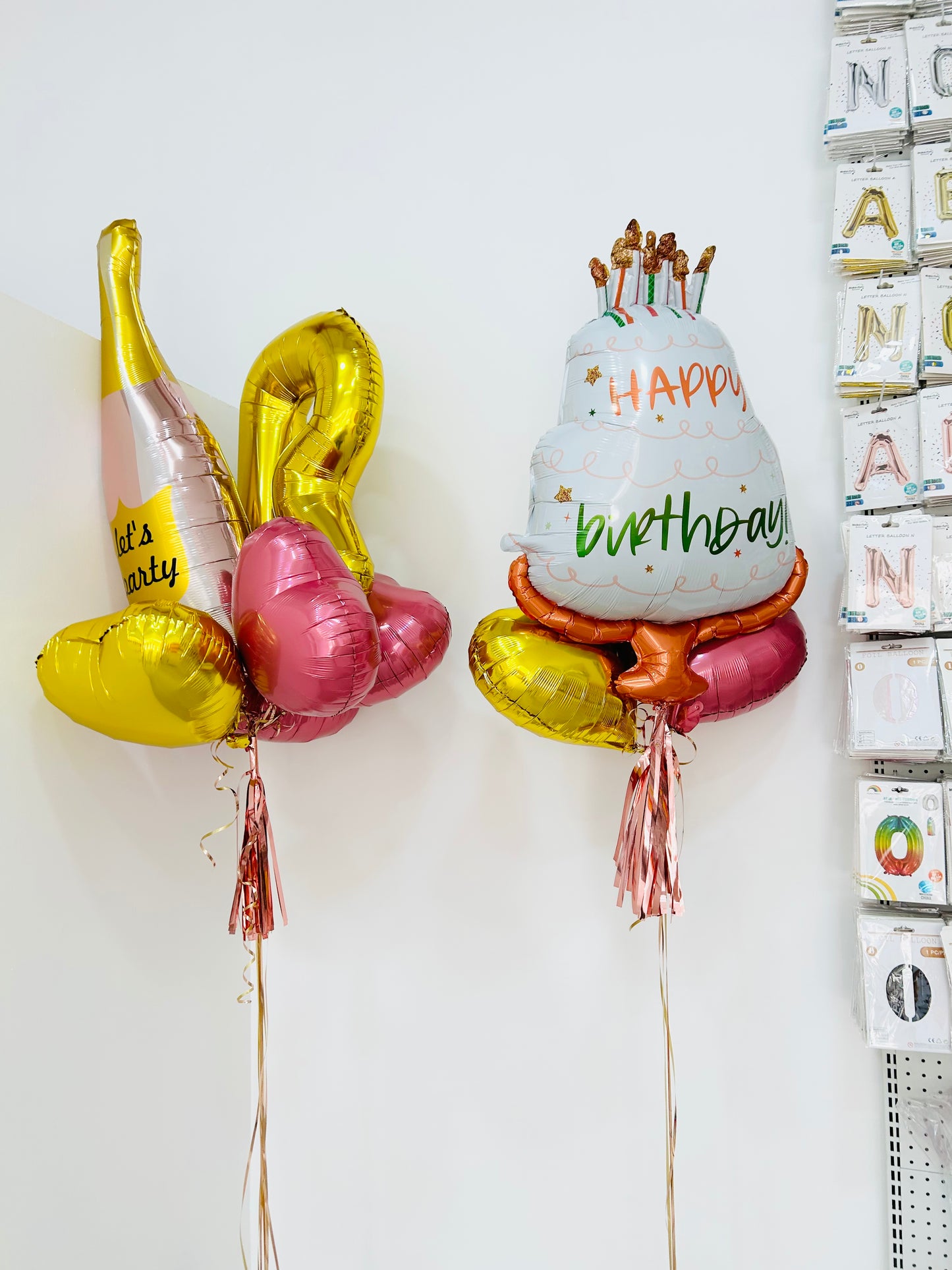 Helium Gold Single Letter Set Balloon with 'Happy Birthday' Foil Balloon, 'Champagne' Foil Balloon and Foil Star Balloons Accents