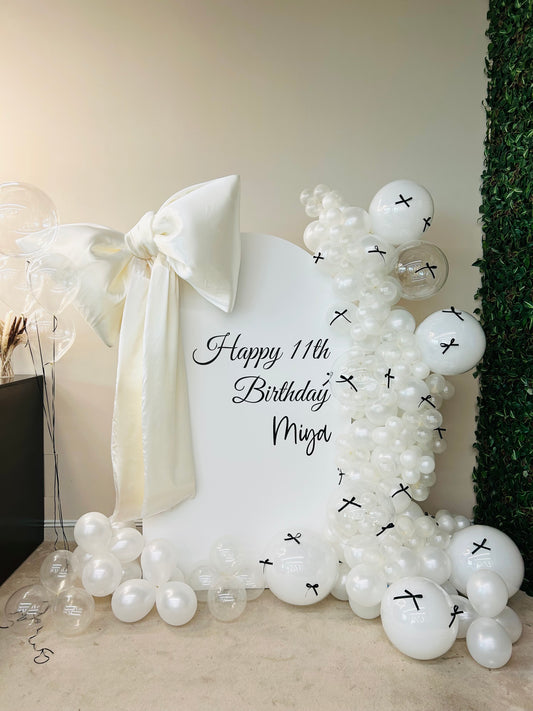 Customize Backdrop with Big Customize Ribbons and Balloon Decor White, Pearl White and Clear with Black Ribbons accents and Helium Clear Balloon Bunch - Perfect for special occasion