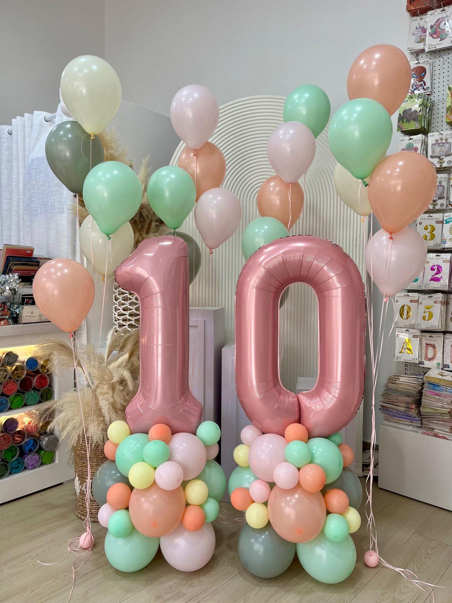 40-inch Numbers 1&0 Balloon on Stand with Bunch Helium Balloons Pastel Colors Peach, Pink, Green and Yellow with Strings - Customizable for Any Celebration