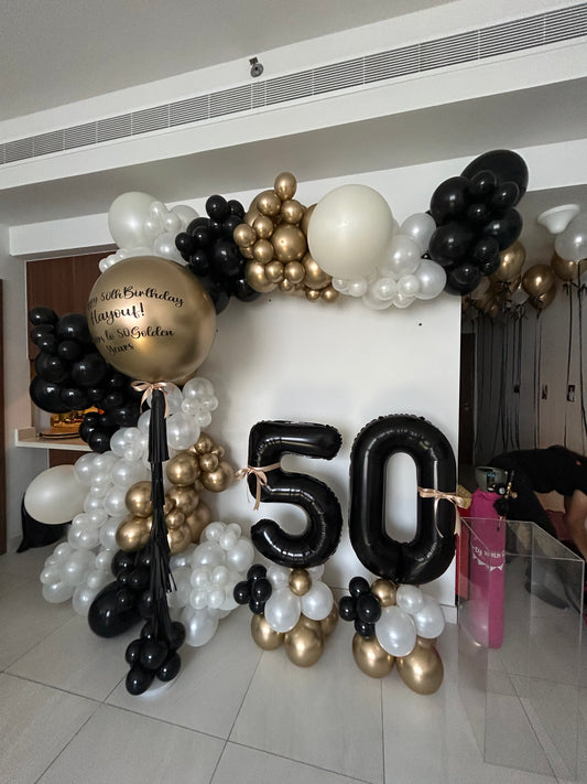 Customizable Balloon Arch Pearl White, Black and Light Gold with Number Balloon on Stand ‘50’ and Personalise Pillar with Customizable Stickers - Perfect for special occasions