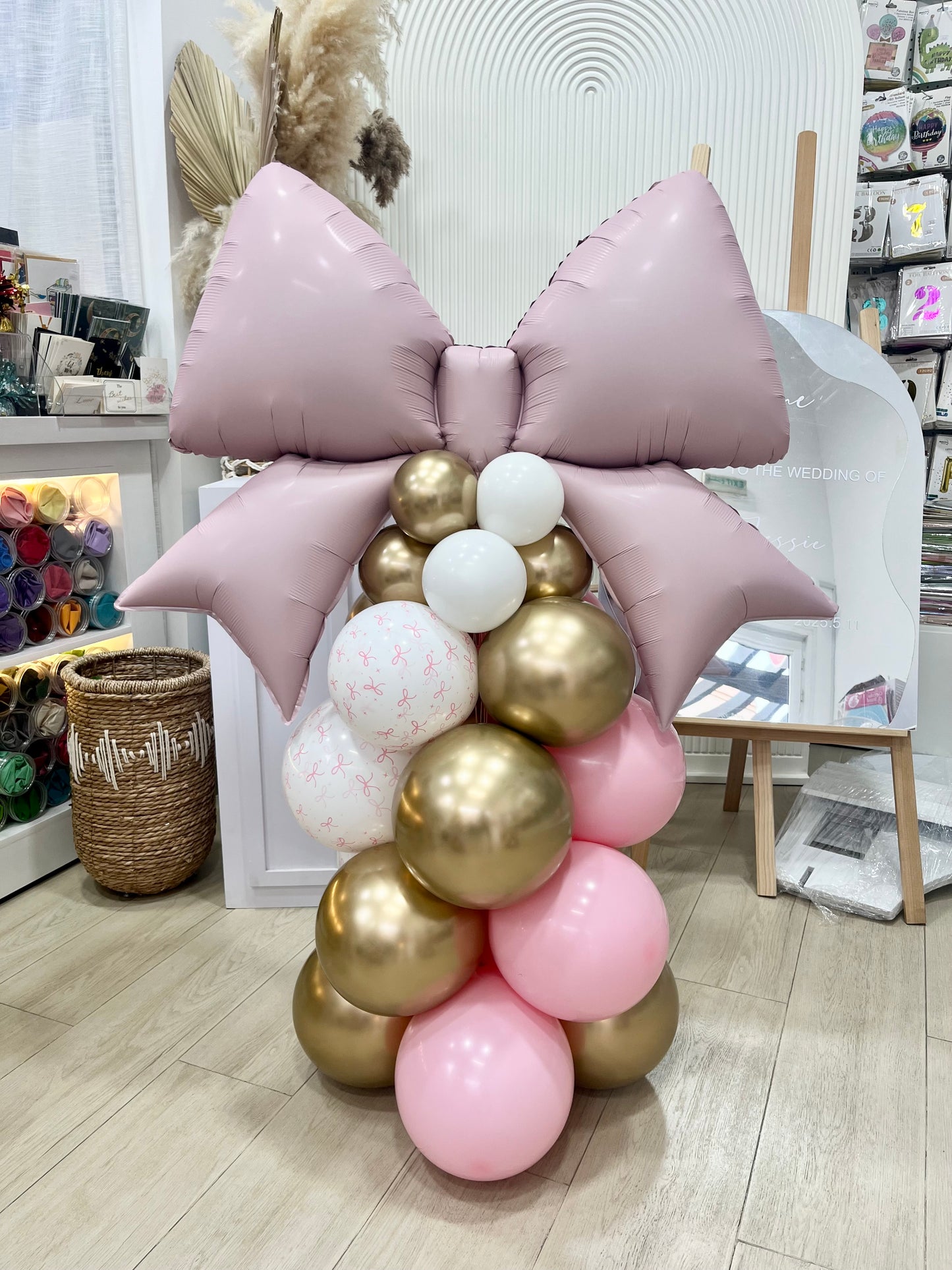 Pink Bow Pillar/Column/Tower Balloons Pink White Light Gold -  Perfect for special occasions!