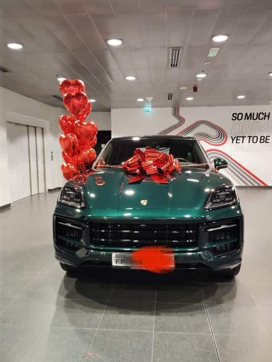 Car Surprise Red Ribbon and Red Hearts Helium Bunch Balloon – Perfect for Any Sleek and Elegant Celebrations